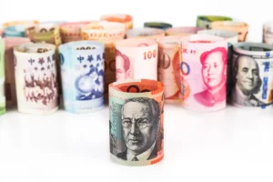 Rolled currency notes representing the best pairs for forex signals in 2025 trading opportunities.