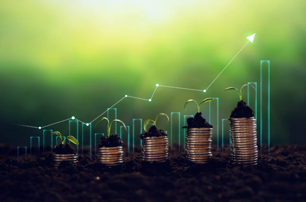 Sustainable Finance concept showing coins with growing plants symbolizing green investment and Forex market growth in 2025.