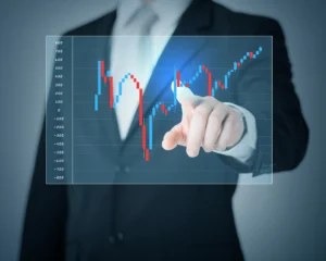 Businessman analyzing financial chart on virtual screen, representing the Volatility Index (VIX) and global market volatility trends.