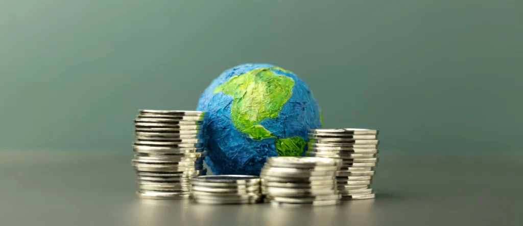 Global Investment Risk and Resilience Index concept with world globe and stacked coins showing economic resilience in 2025.