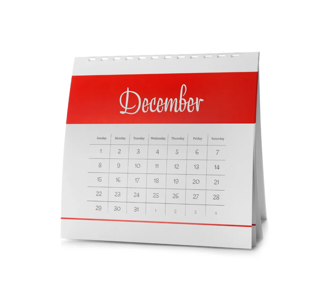 A December desk calendar representing key events to watch in December for traders and investors.