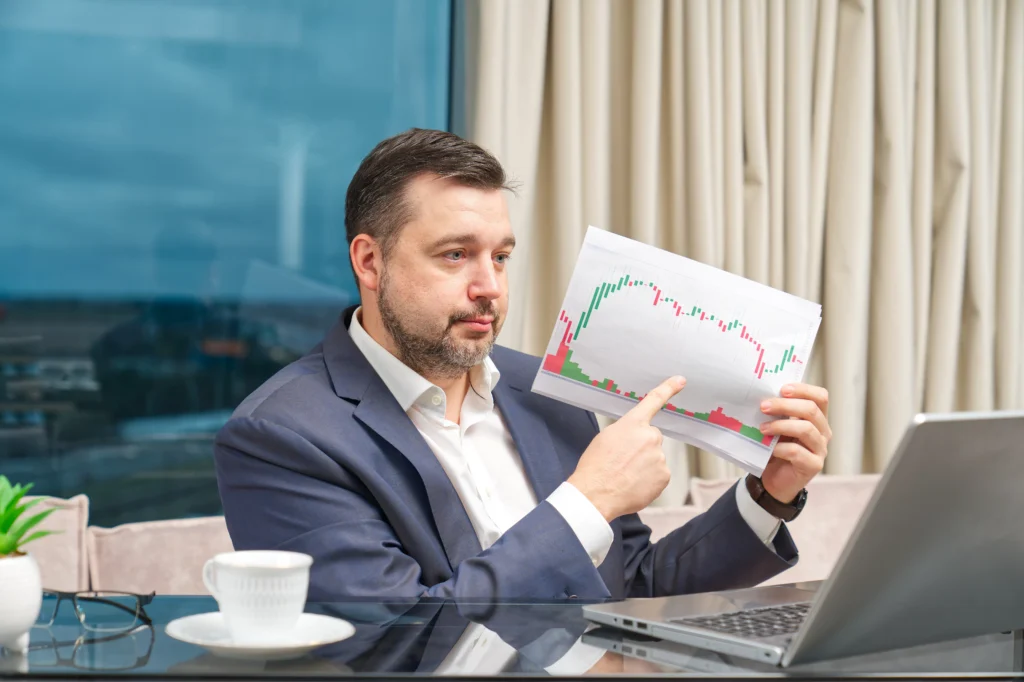 Trader analyzing rejection block in trading chart during a live market session