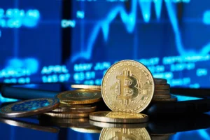 Crypto Trading Strategies represented by golden Bitcoin coins in front of a digital market chart